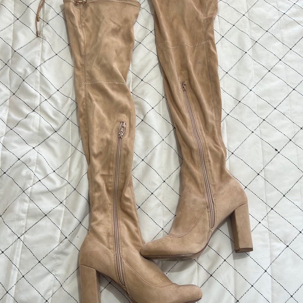 Thigh high cream boots